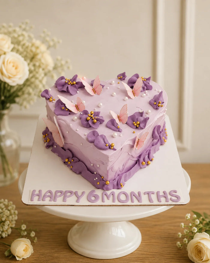 Heart-Shaped Half Birthday Butterfly Garden Birthday Cake in Meerut