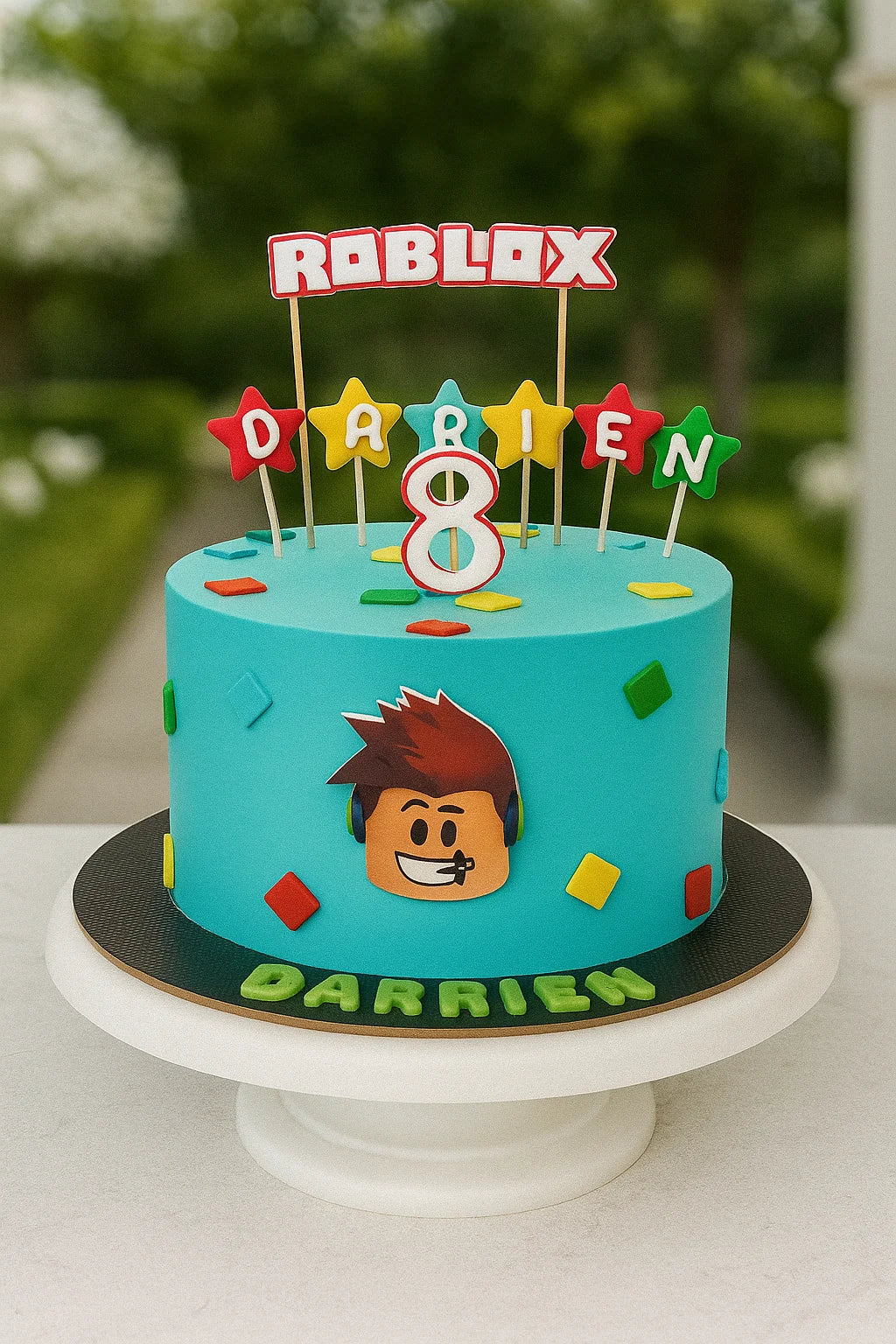 Roblox-themed birthday cake with candles and character on a stand outdoors.