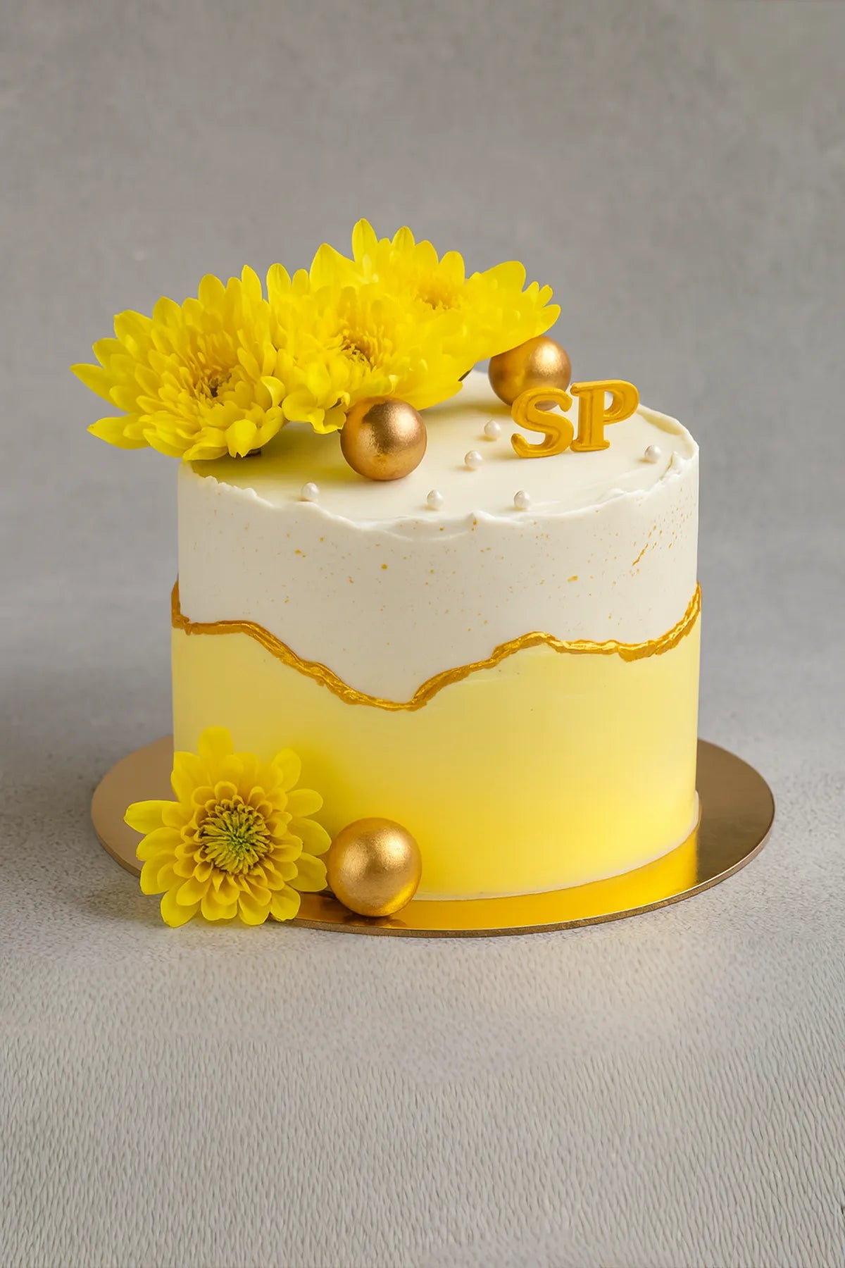 Yellow Floral Cream Cake in Meerut-The Baking Kaur